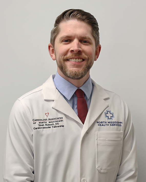 A healthcare professional in a white coat with logos and text representing a cardiology fellowship.